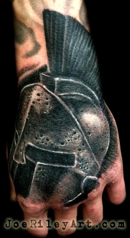 Black Ink 3D Warrior Helmet Tattoo On Hand