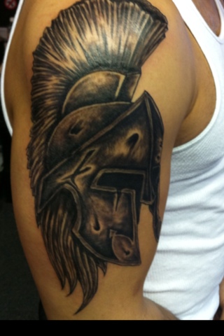 Black Ink Warrior Helmet Tattoo On Right Half Sleeve