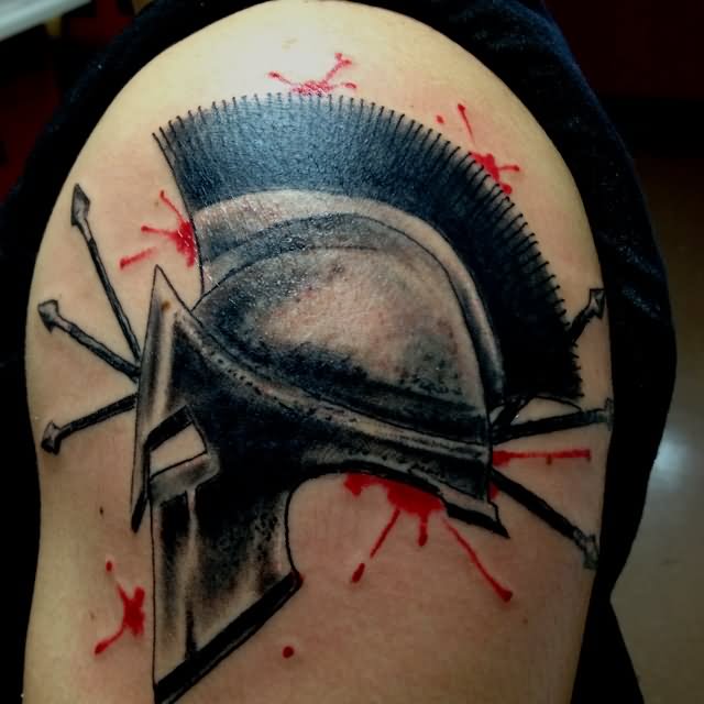 Black Ink Warrior Helmet Tattoo On Shoulder