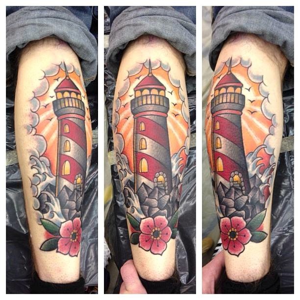 Flowers And Neo Traditional Lighthouse Tattoo by Daniel Dubay