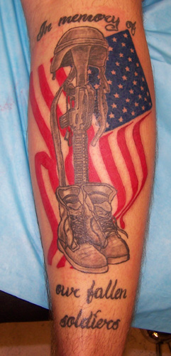 Memorial Army Equipment With USA Flag Tattoo On Leg
