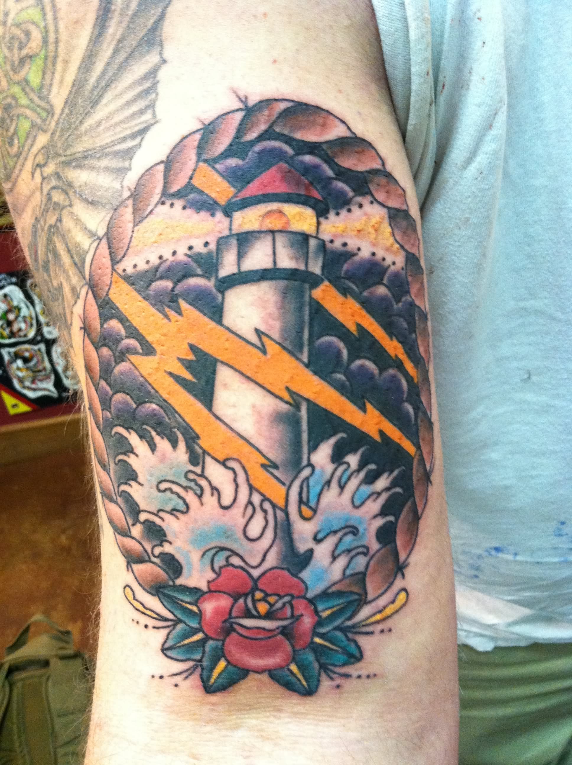 Neo Traditional Lighthouse Tattoo On Bicep