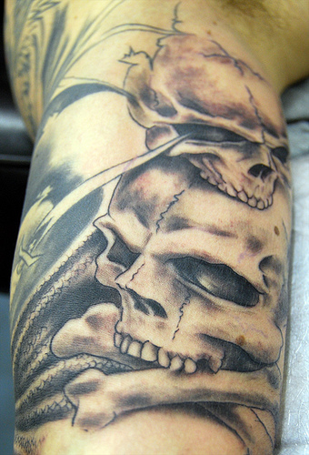 3D Danger Skull Bone Tattoo Design For Half Sleeve