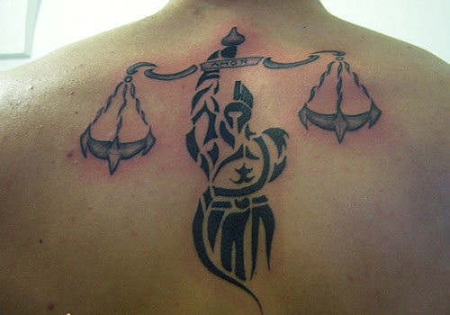 Amazing Black Tribal Libra Tattoo On Back