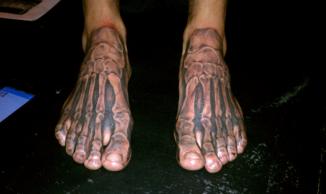 Amazing Bone Tattoo On Feet