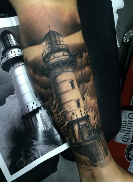 Black And Grey Ink Lighthouse Tattoo On Leg by Fredy Tattoo