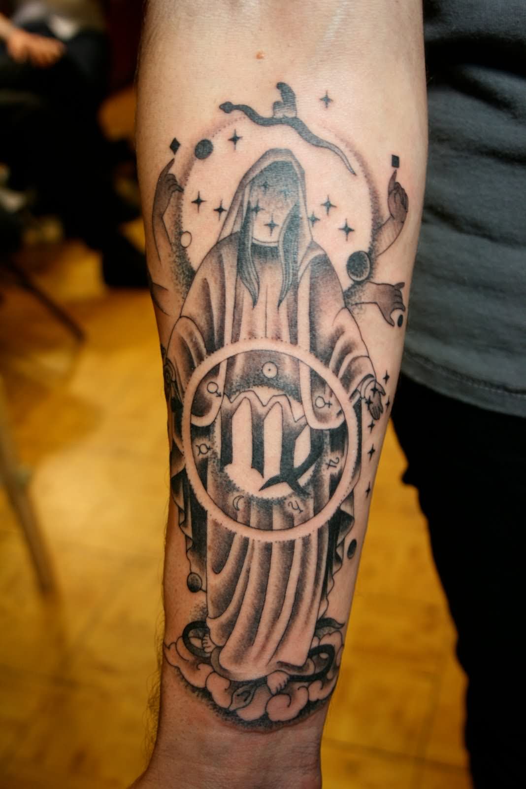 Black And Grey Virgo Tattoo On Right Forearm