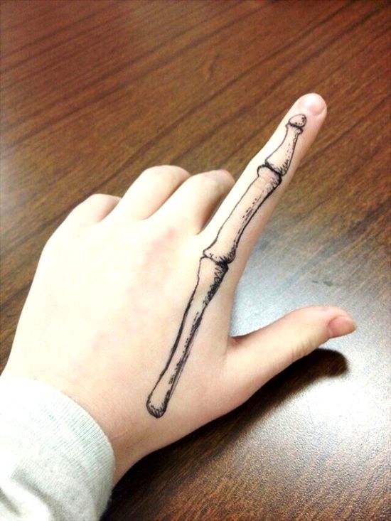 Black Bone Tattoo On Finger