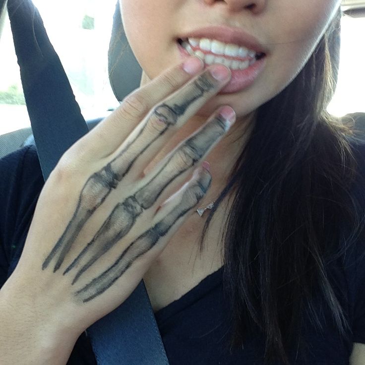 Black Bone Tattoo On Girl Hand