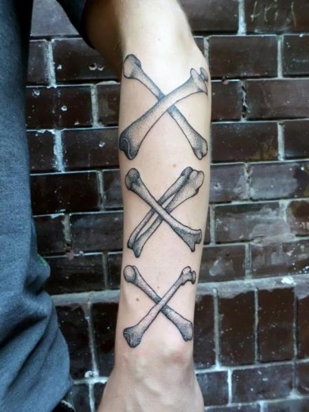 Black Crossing Bones Tattoo On Forearm