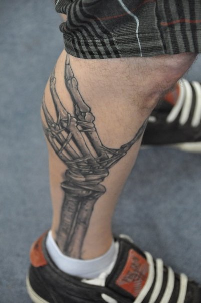 Black Ink Arm Bone Tattoo On Leg