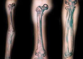 Black Ink Bone Tattoo On Arm