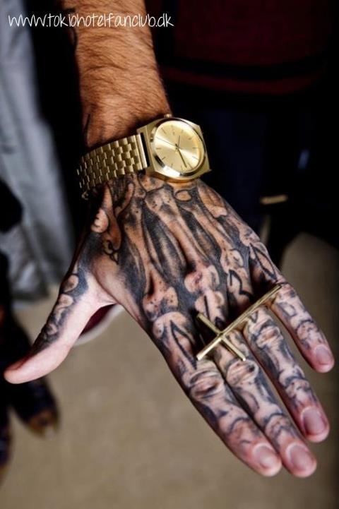 Black Ink Bone Tattoo On Hand