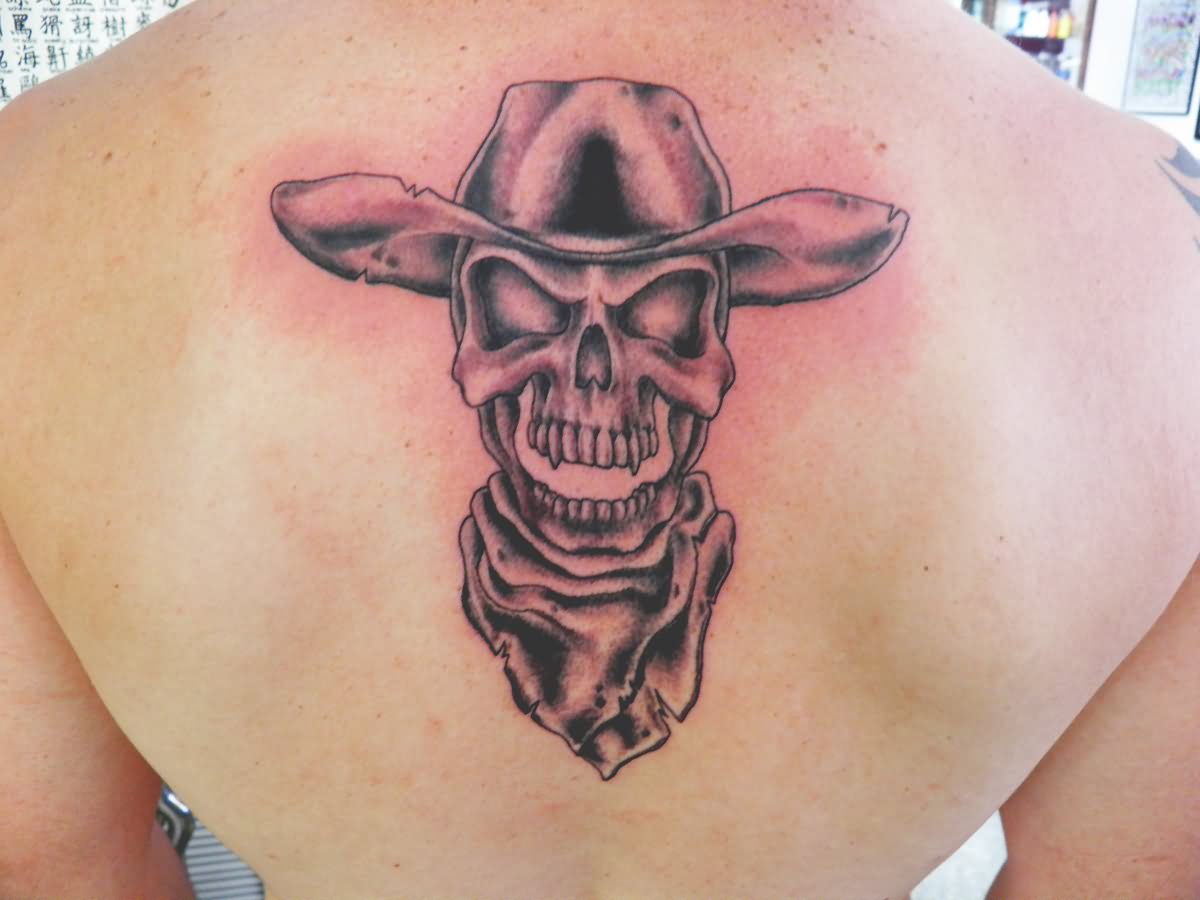 Black Ink Cowboy Skull Tattoo On Man Upper Back