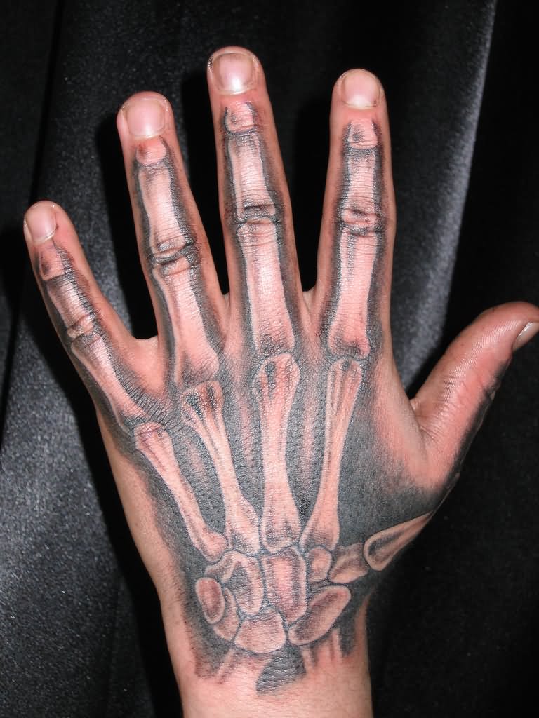 Black Ink Hand Bone Tattoo On Hand