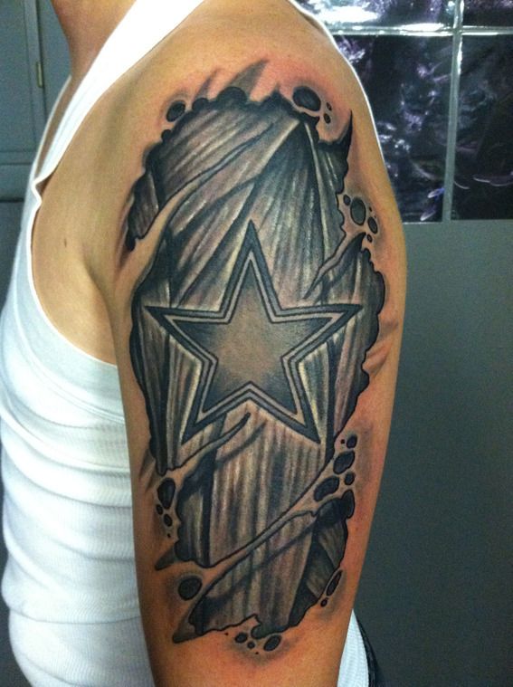 Black Ink Ripped Skin Cowboy Star Tattoo On Man Left Half Sleeve