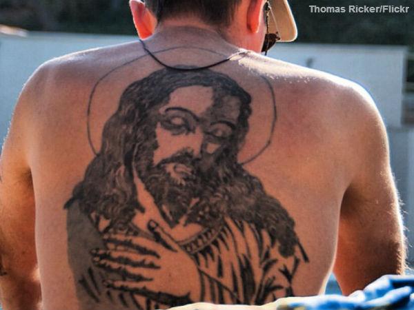 Black Ink Simple Christian Jesus Tattoo On Man Upper Back