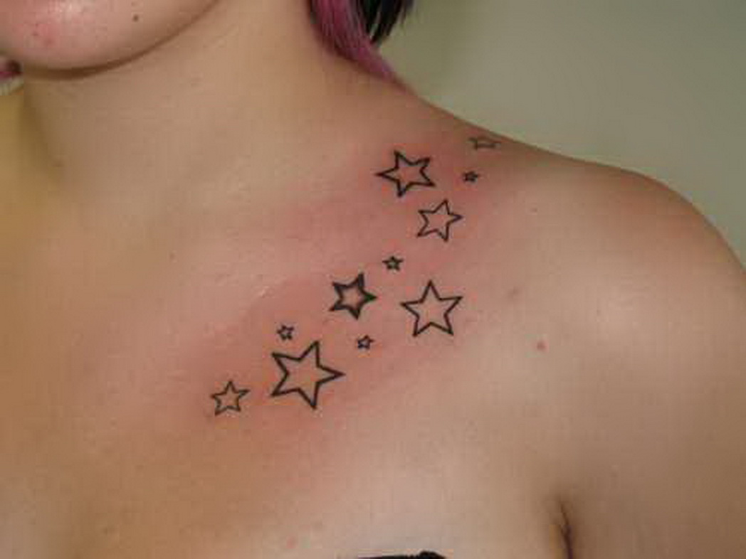 Black Ink Stars Tattoo On Collarbone