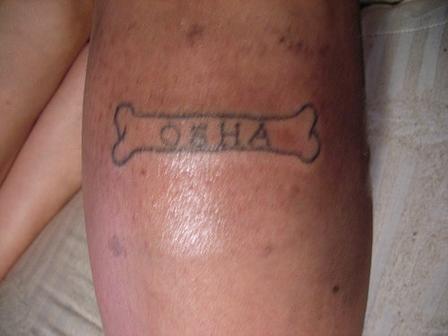 Black Outline Bone Tattoo On Leg Calf