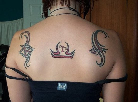 Black Tribal Libra Sun Sign Tattoo On Back Body