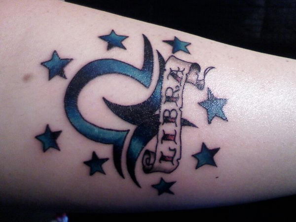 Blue And Black Libra Zodiac Tattoo On Leg