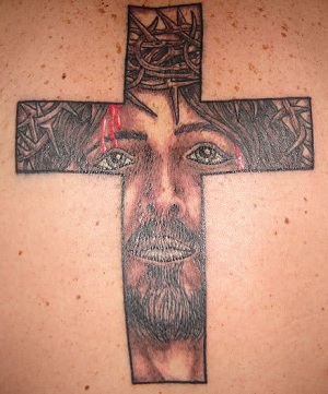 Christian Jesus Face In Cross Tattoo Design