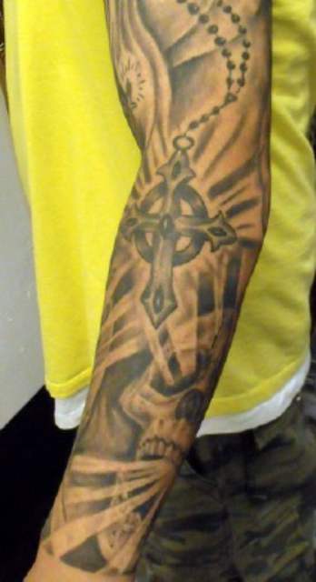 Christian Rosary Cross And Skull Tattoo On Man Left Full Sleeve