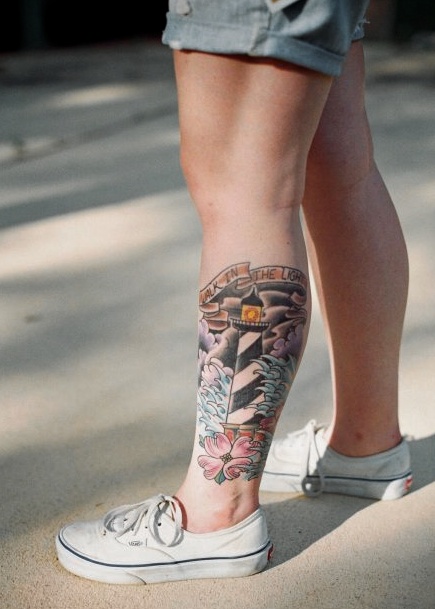 Color Flowers And Lighthouse Tattoo On Girl Left Leg
