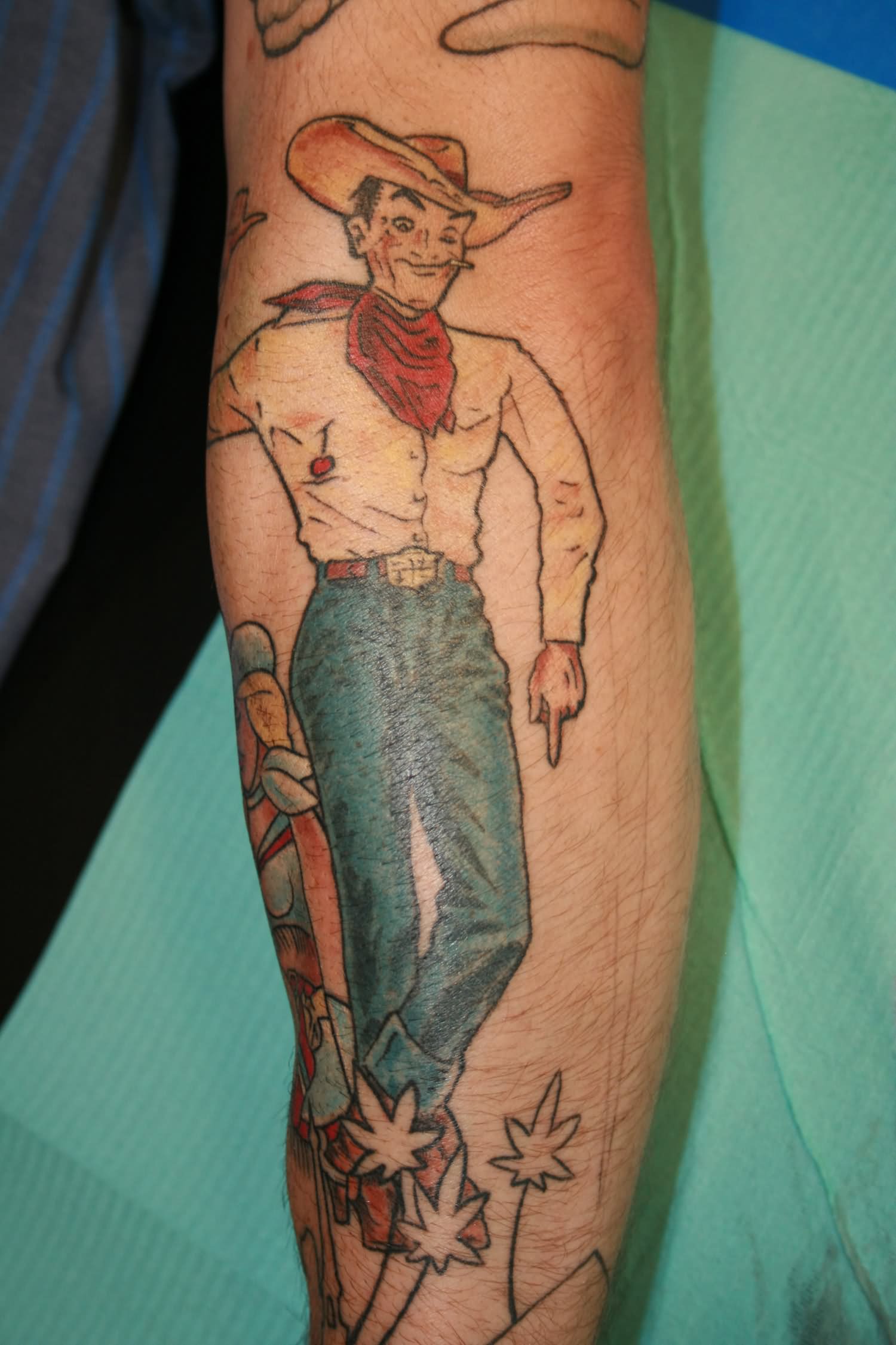 Colorful Smoking Cowboy Tattoo Design For Forearm
