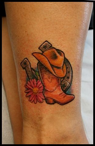 Cowboy Boot With Horseshoe Tattoo Design For Thigh