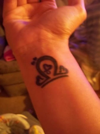 Cute Libra Tattoo On Right Wrist