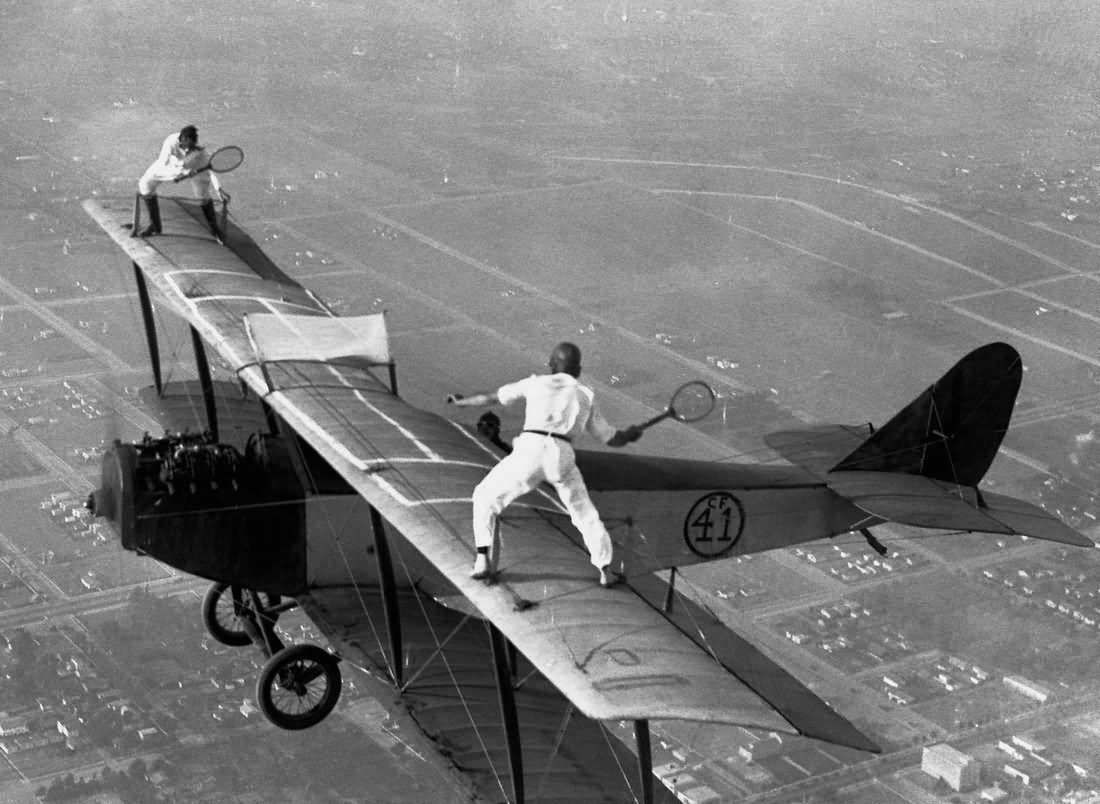 Funny Badminton Playing On Plane Roof Black And White Image For Whatsapp