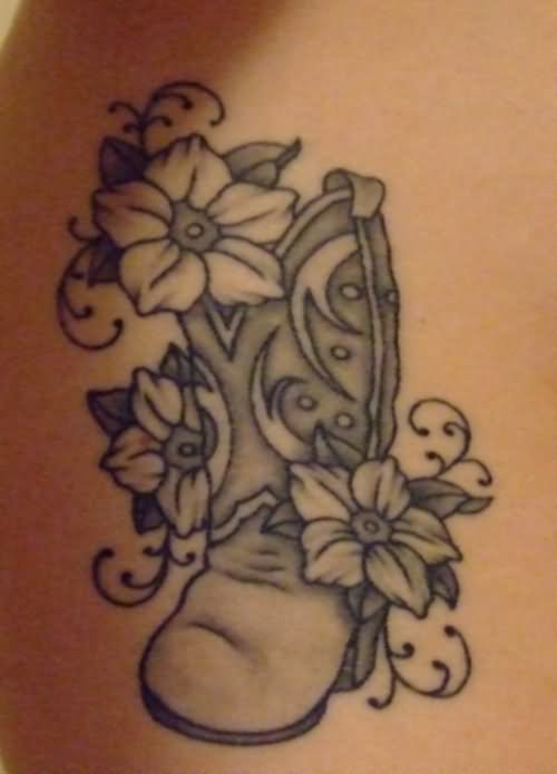Grey Ink Cowboy Boot With Flowers Tattoo Design