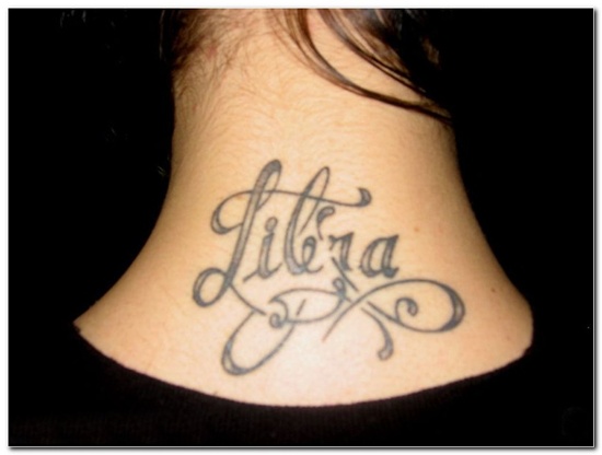 Grey Ink Libra Word Tattoo On Upper Back