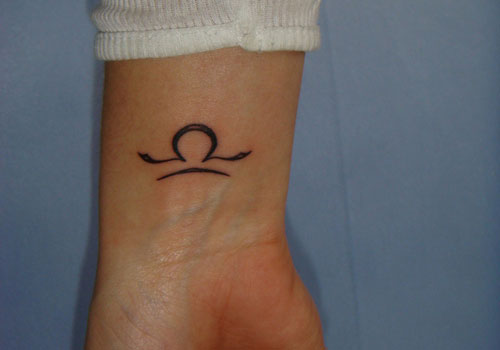 Nice Libra Sun Sign Tattoo On Wrist