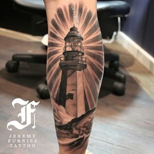 Realistic Lighthouse Tattoo On Back Leg
