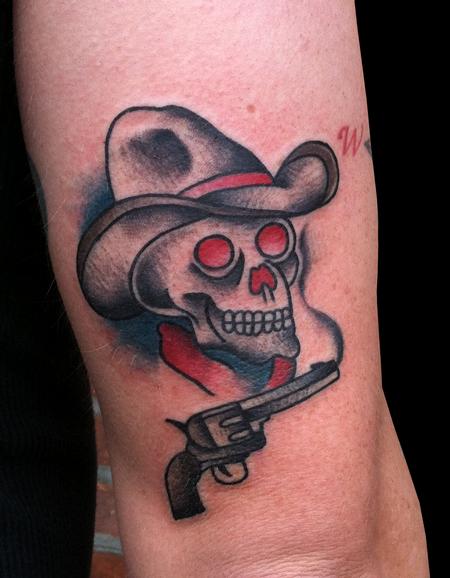 Red And Black Traditional Cowboy Skull With Gun Tattoo Design For Sleeve