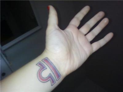 Red Ink Libra Zodiac Sign Tattoos On Wrist