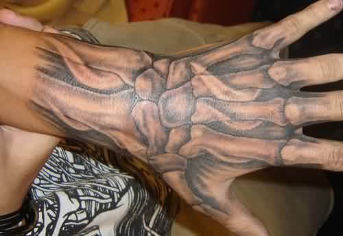 Simple Black Ink Hand Bone Tattoo On Hand