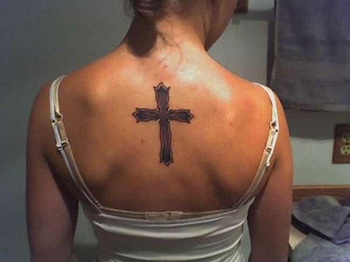 Simple Christian Cross Tattoo On Girl Upper Back