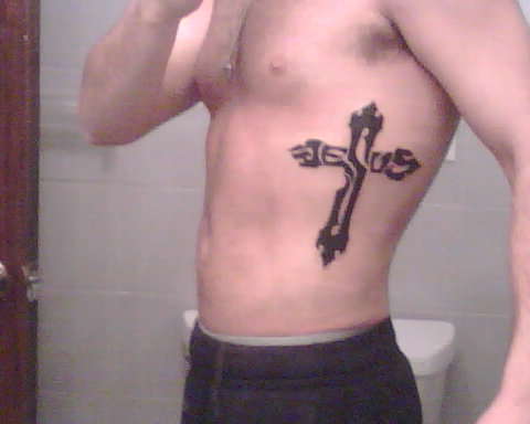 Simple Christian Cross Tattoo On Man Side Rib