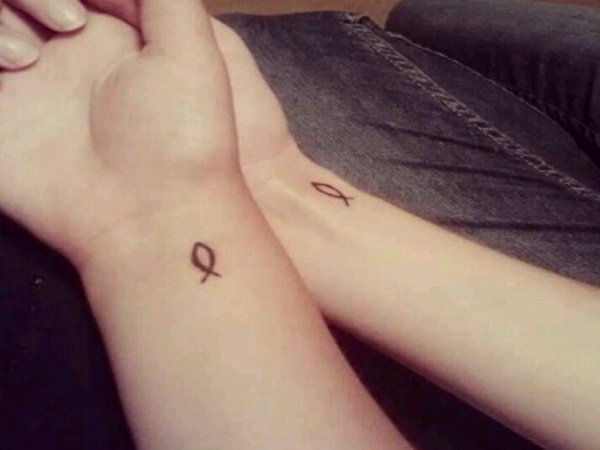 Simple Christian Jesus Fish Tattoo On Couple Wrist