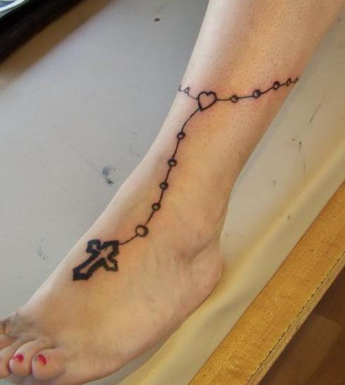 Simple Christian Rosary Cross Tattoo On Girl Foot