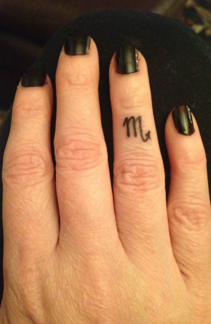 Small Virgo Sun Sign Tattoo On Finger