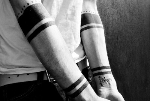 Solid Armband Tattoo On Both Forearm