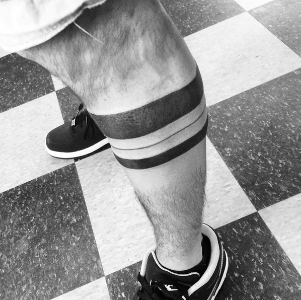 Solid Band Tattoo On Left Leg Calf