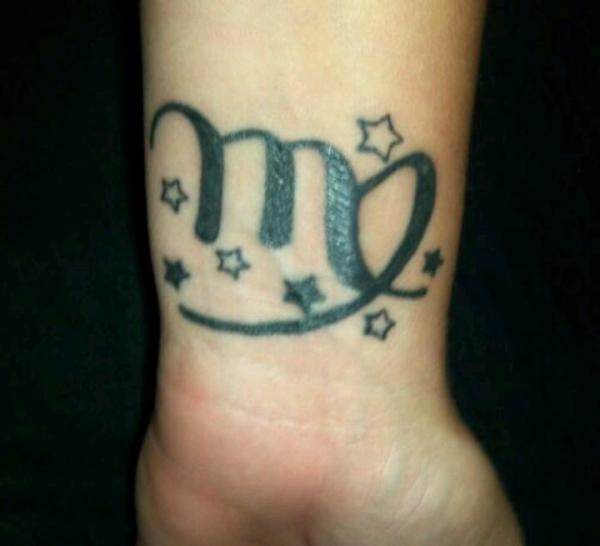 Stars And Virgo Tattoo On Left Wrist