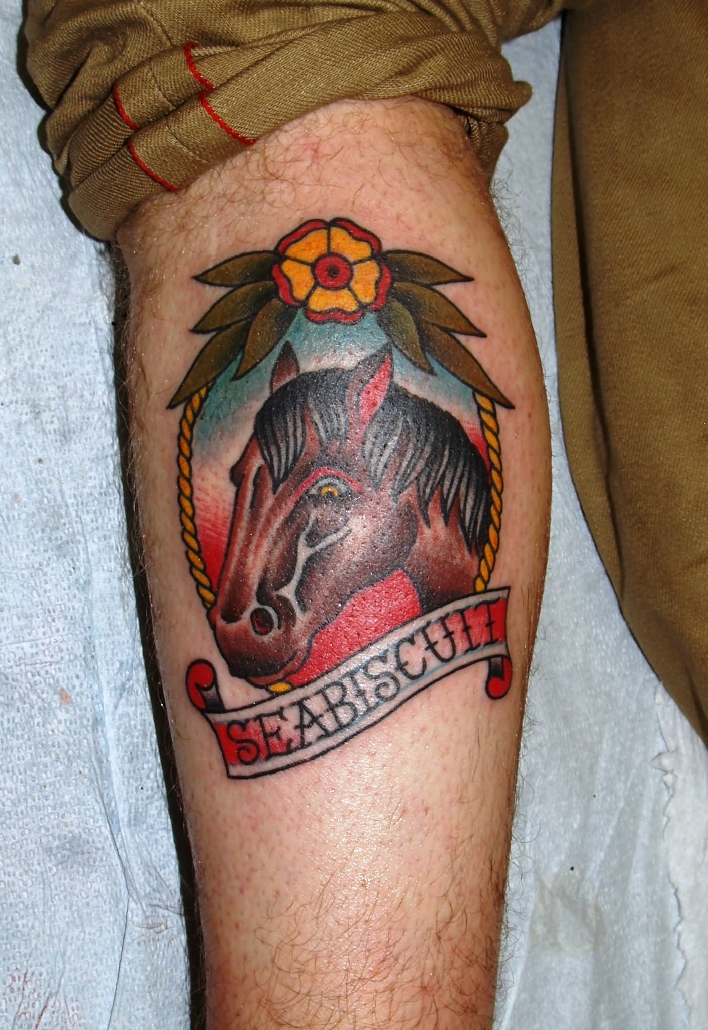 Traditional Cowboy Horse Head In Frame With Banner Tattoo On Leg Calf