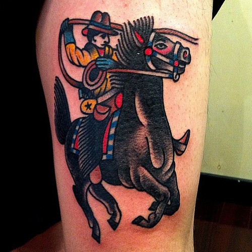 Traditional Cowboy Riding Horse Tattoo Design For Half Sleeve
