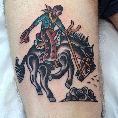 Traditional Cowboy Riding Horse Tattoo Design